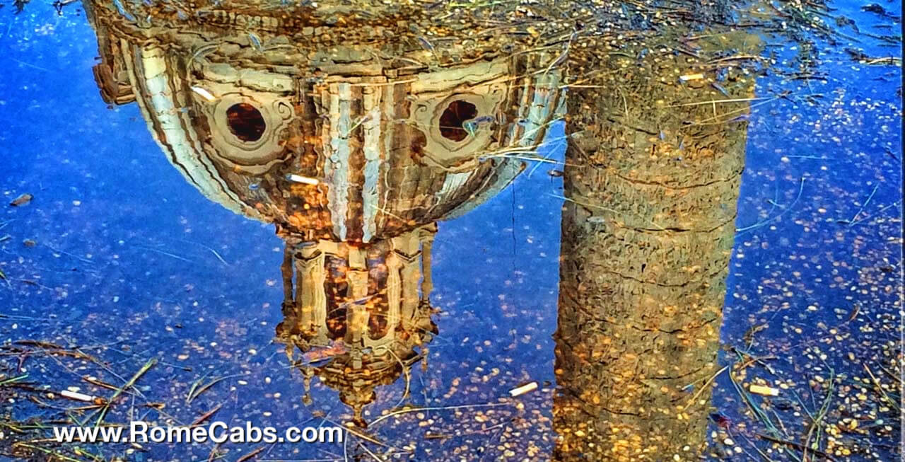 Monument reflection in pool of rainwater Spring in Rome Tours from Civitavecchia Shore Excursions RomeCabs