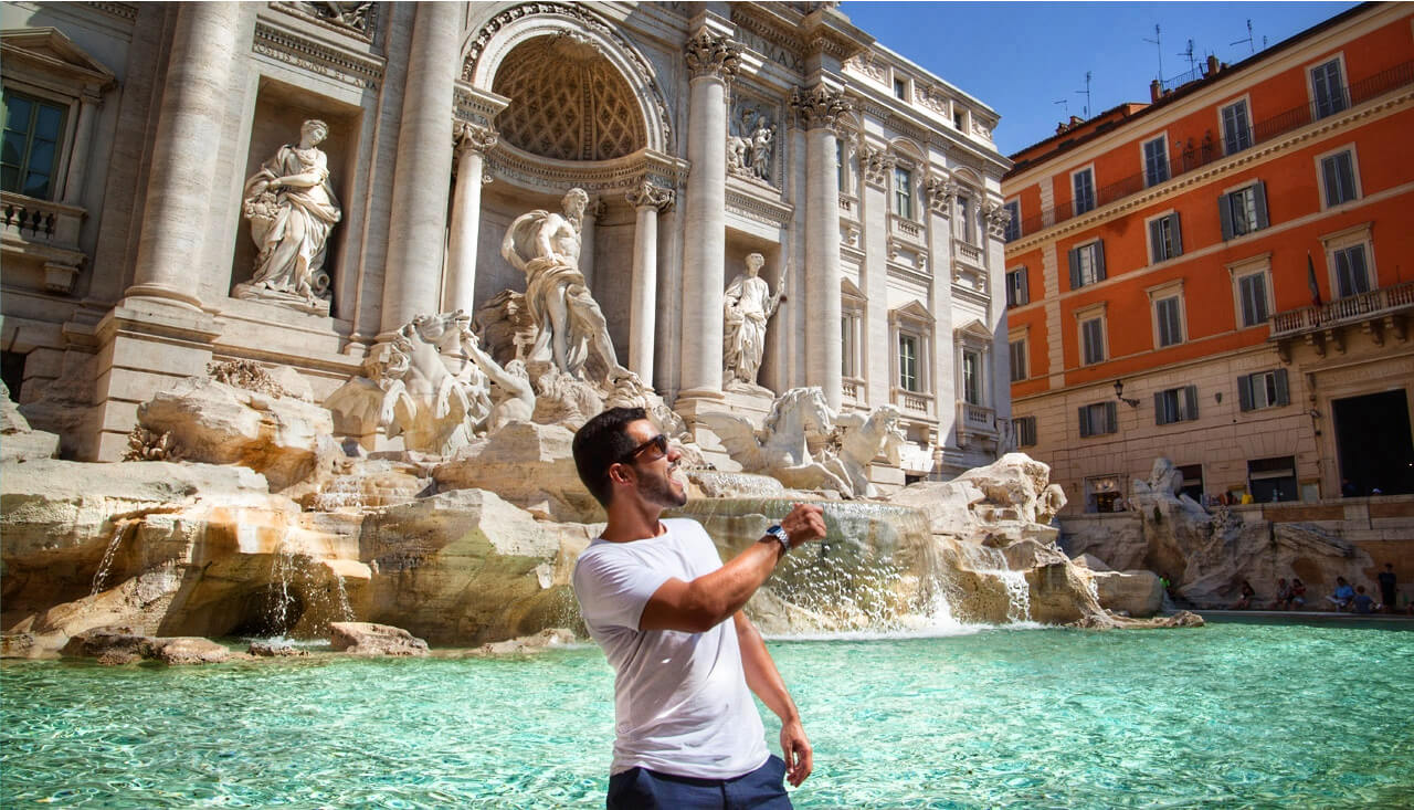 How to toss a coin into Trevi Fountain Rome sightseeing Tours