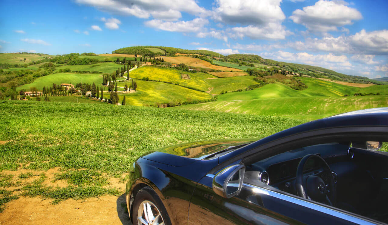 visit Tuscany from Rome to Montichiello windy road Val d'Orcia
