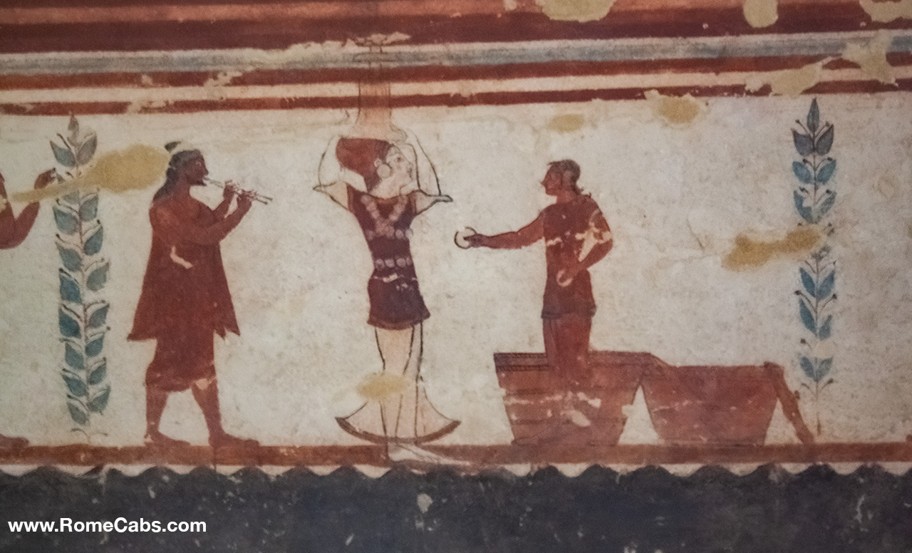 Ancient Etruscan Women tomb frescoes in Monterozzi Necropolis in Tarquinia day trips from Rome Civitavecchia tours