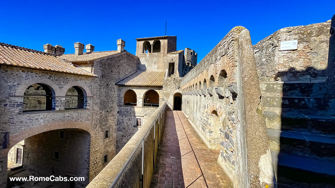 Military Walkway toward Loggia with 2 arches Bracciano Castle Tour Guide